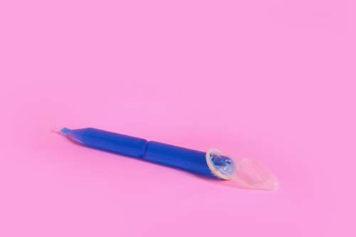 unporn blue pen on pink surface blue